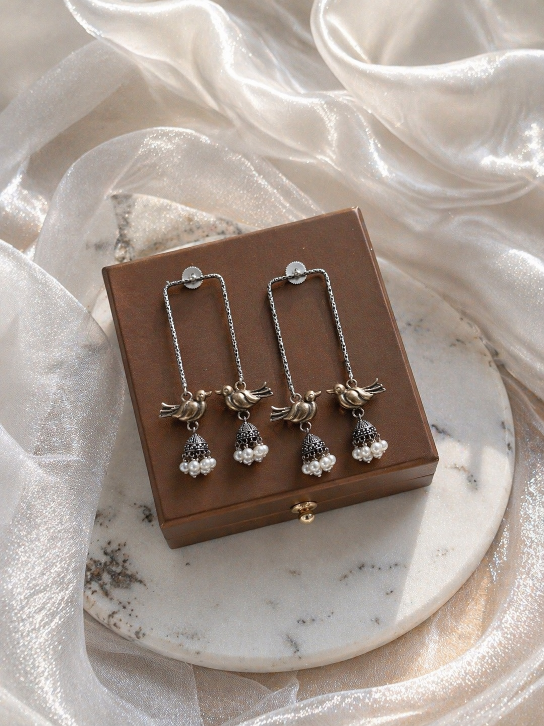 Dual tone Silver Peacock Earrings With Ghungru