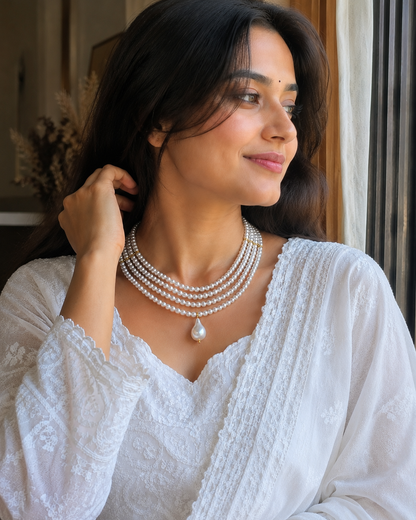 Moti haar | white pearl necklace | layered choker