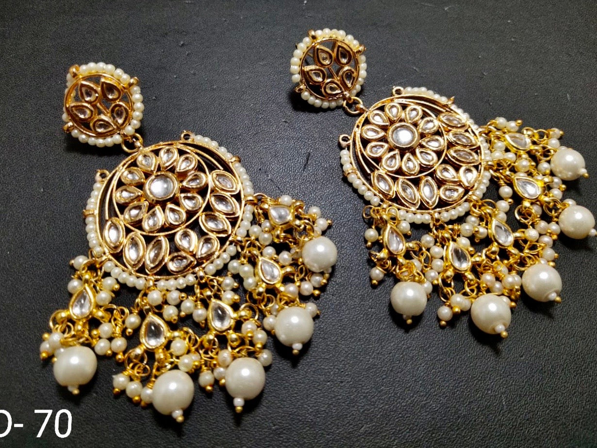 GOLD TONED PEARL AND KUNDAN STUDDED EARRINGS